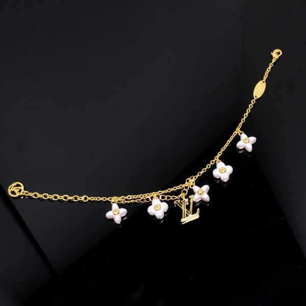 ˇMagic JewelryˇLOGO 6 MOTIF STAR AND SUN GOLD BRACELET